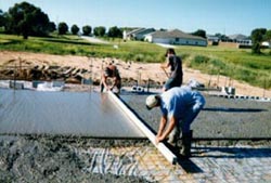 Picture of men working on a roof.