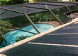 Picture of a pool and attached solar thermal system.