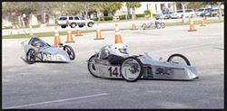 Photo of Electrathon race cars on the track.