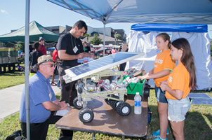 Photo of middle school kids with their energy innovation.