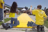 Picture of two students racing Junior Solar Sprint Cars.