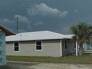 White metal roof home