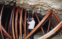 Picture of an FSEC researcher taking IR pictures of an attic.