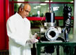 Picture of an FSEC researcher in the materials laboratory.