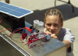 Picture of student generating hydrogen on their race car.