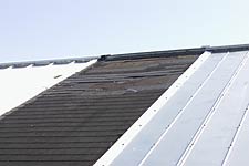 Photo: Close-up of different types of roofing on a test roof.