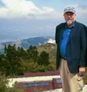 Photo of Bill Young with pv panels and ocean in background