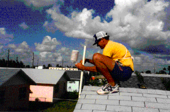 photo of man on roof.
