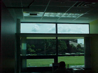 Photo of an office window showing the lighting shelf.