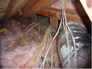 Photo of attic space with supply duct