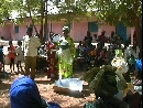 Teaching community members how to use solar cookers