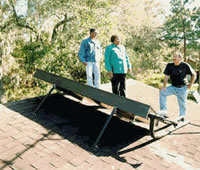 Picture of peopel standing on a roof with a SWAP system.